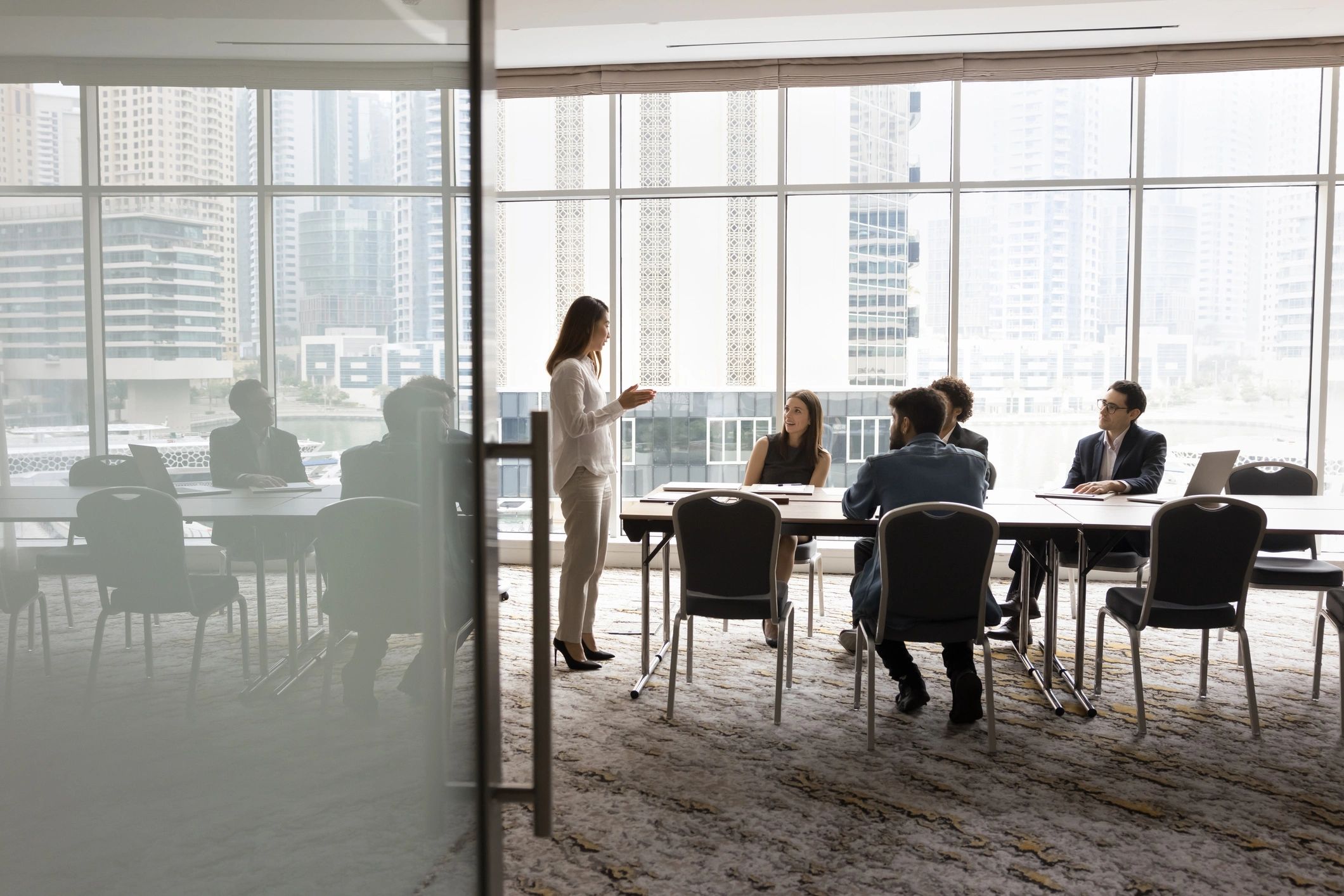Akili technology team collaborating in a modern office